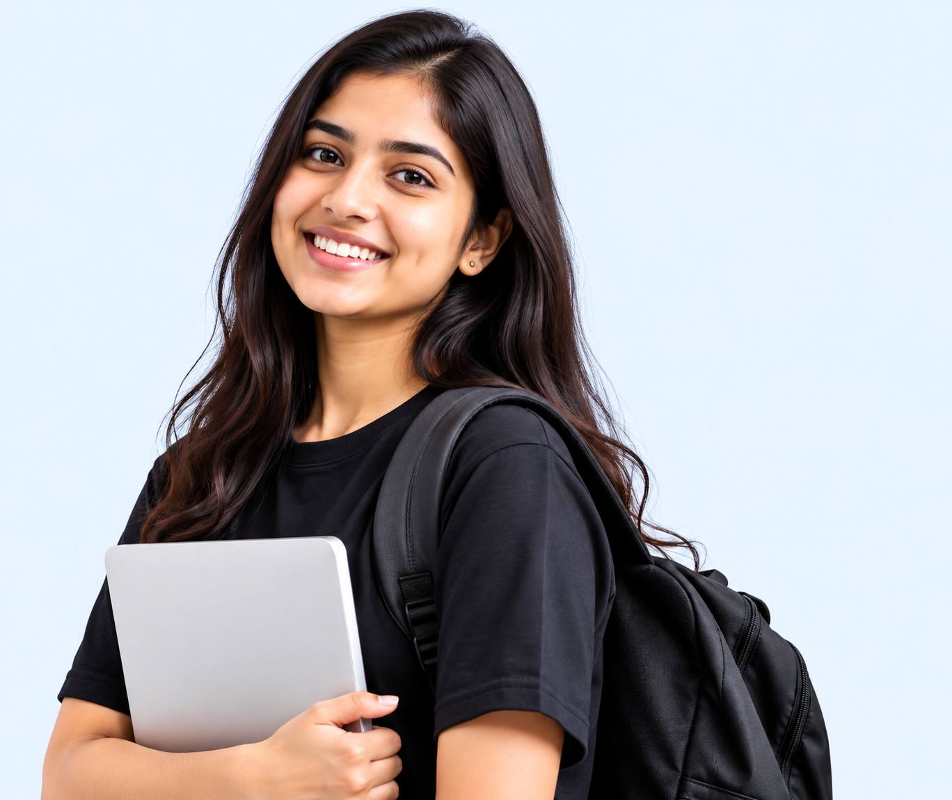Indian student holding a laptop